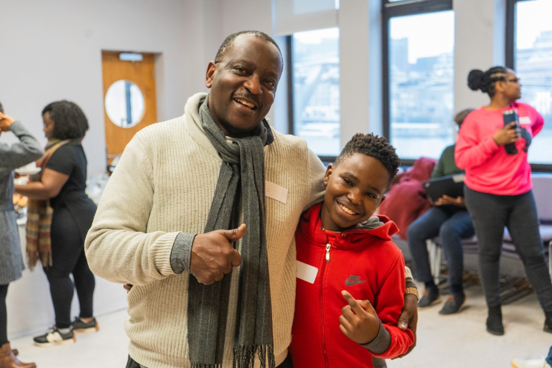 Portrait photography of a father and son attending an event at City of London school