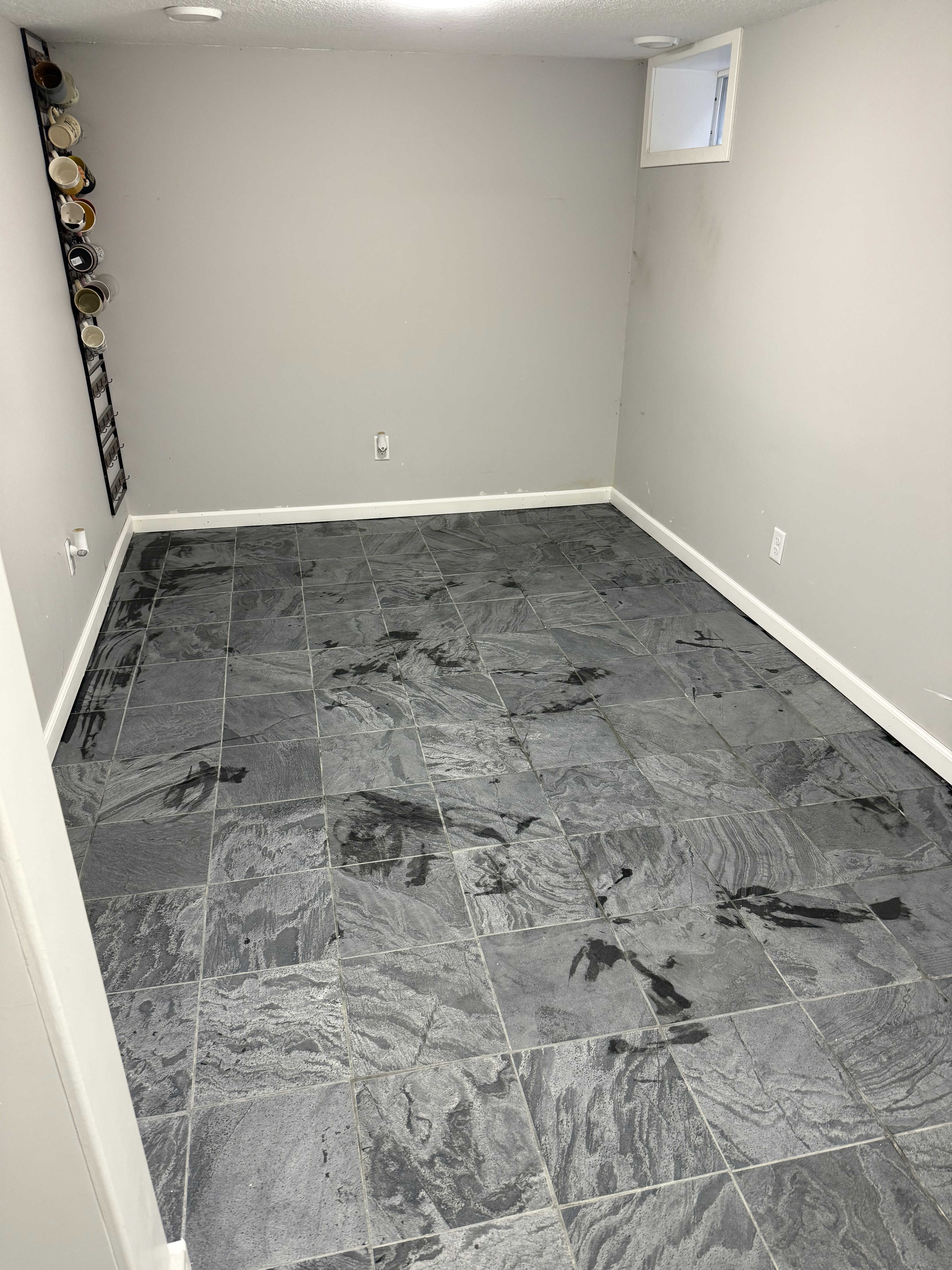honed quartzite tile in basement floor