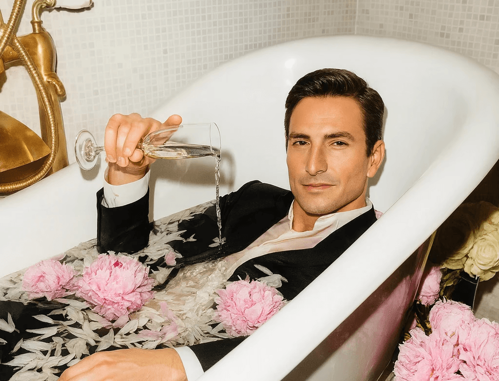Modern bathroom with wooden cabinetry, minimalist design, large windows, and a view of greenery outside.