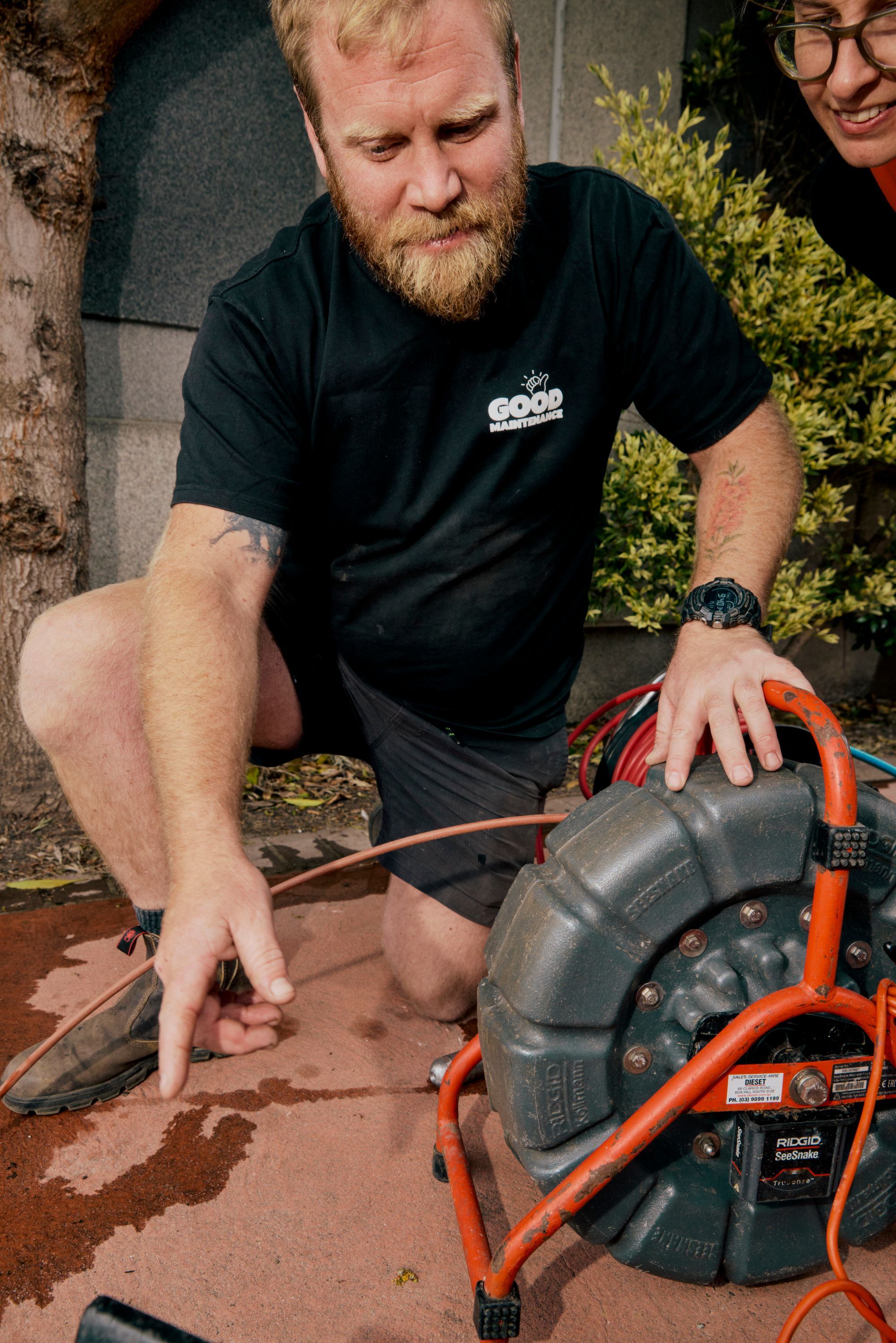 Plumber working on a job at a property
