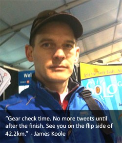 James Koole checking his running gear before the Vancouver Marathon.