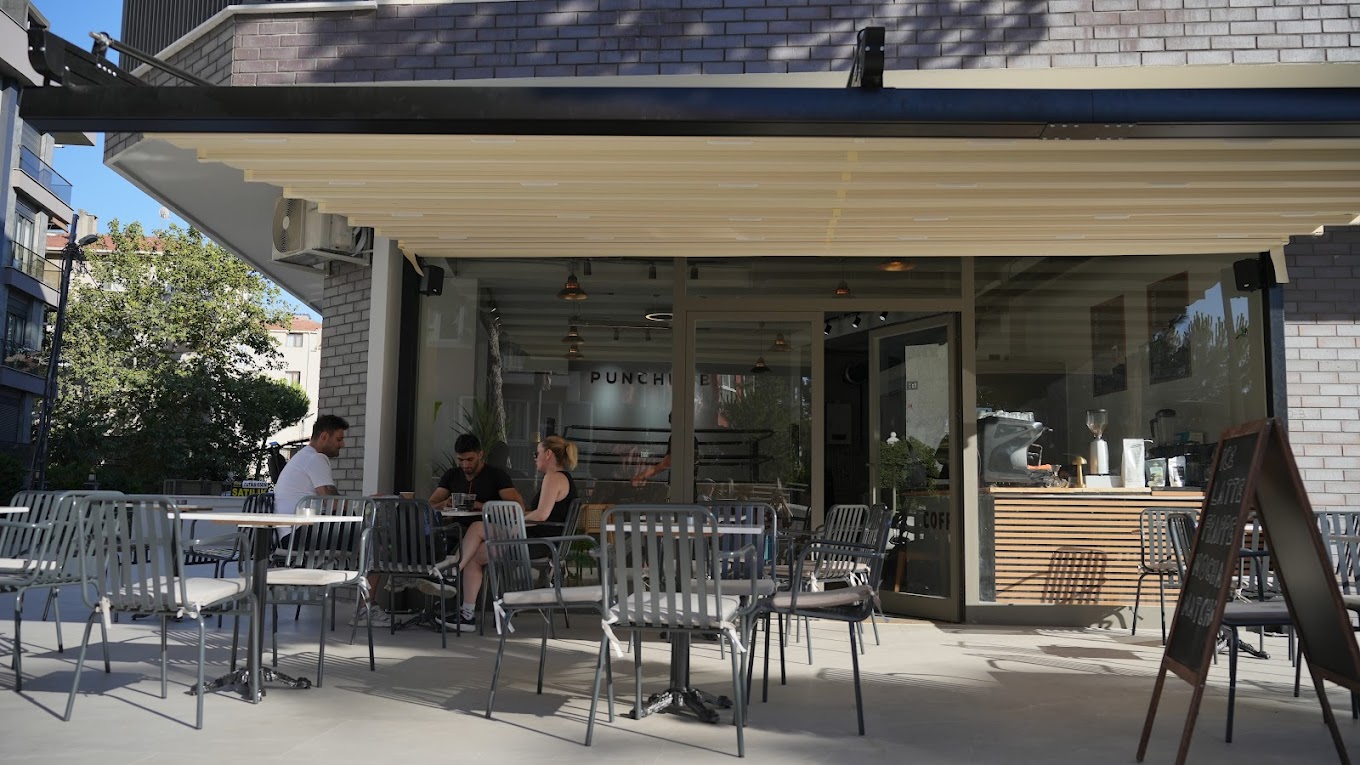a building with trees and plants