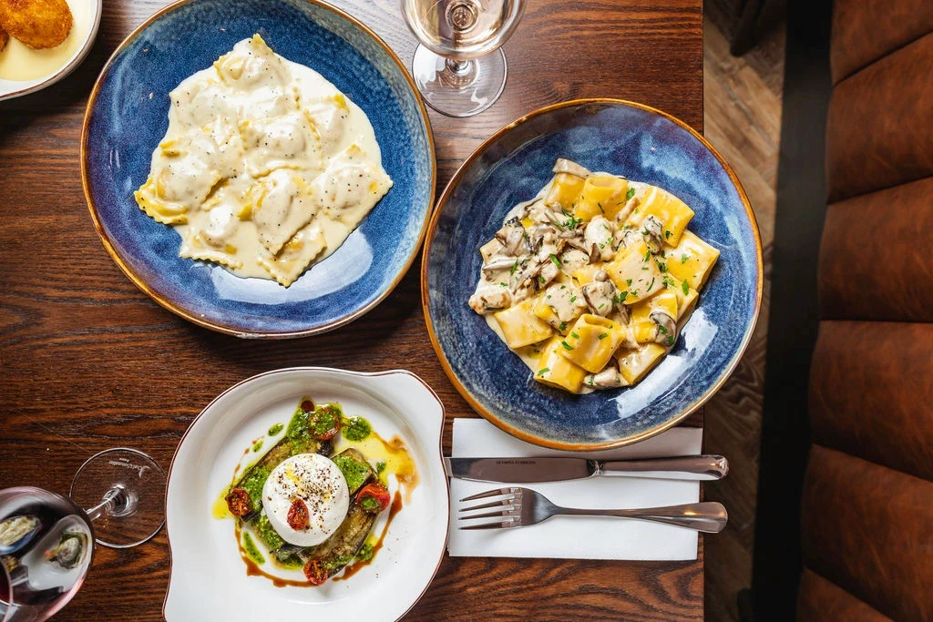 mantu served in a white plate