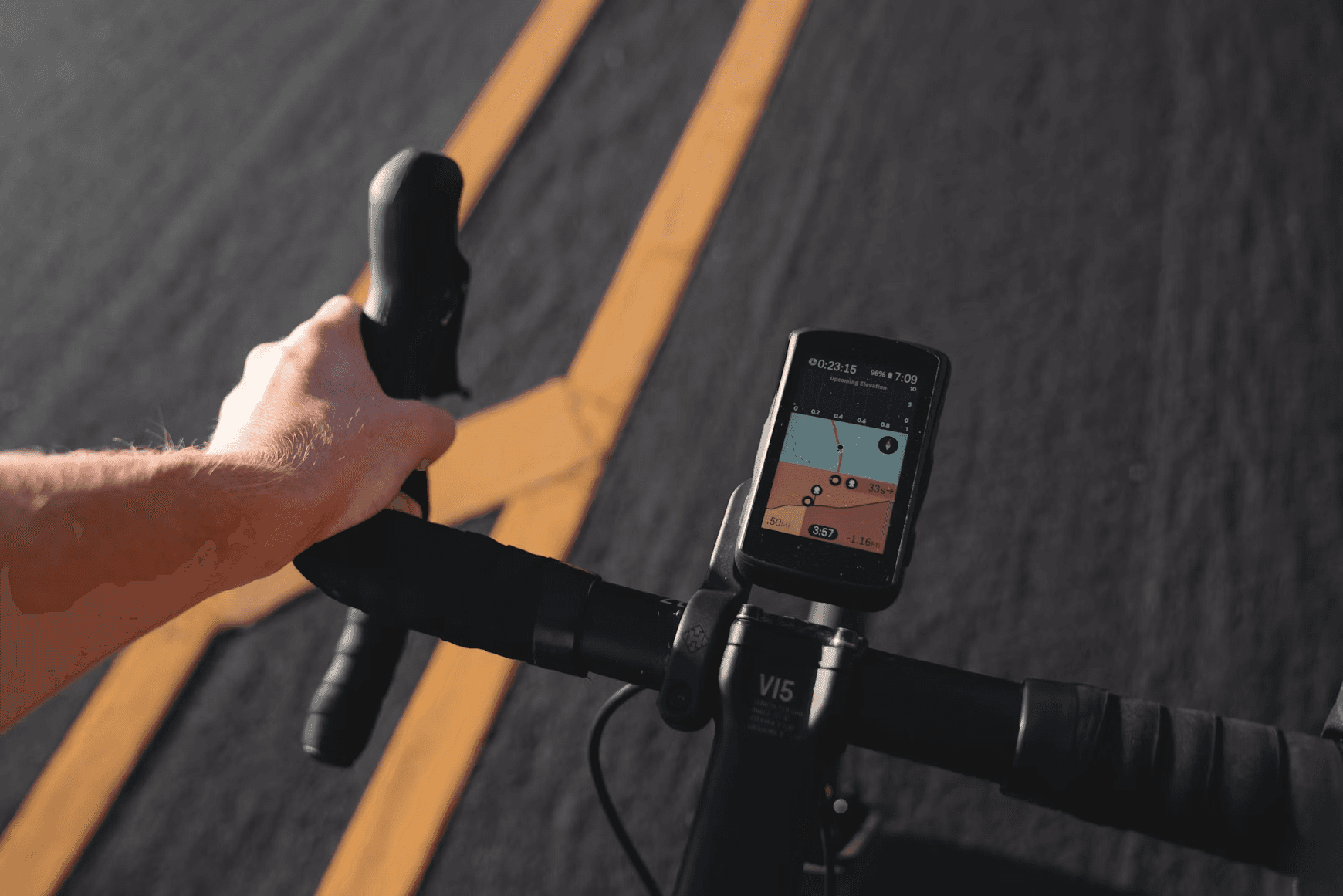 Cyclist viewing route data on a handlebar-mounted device