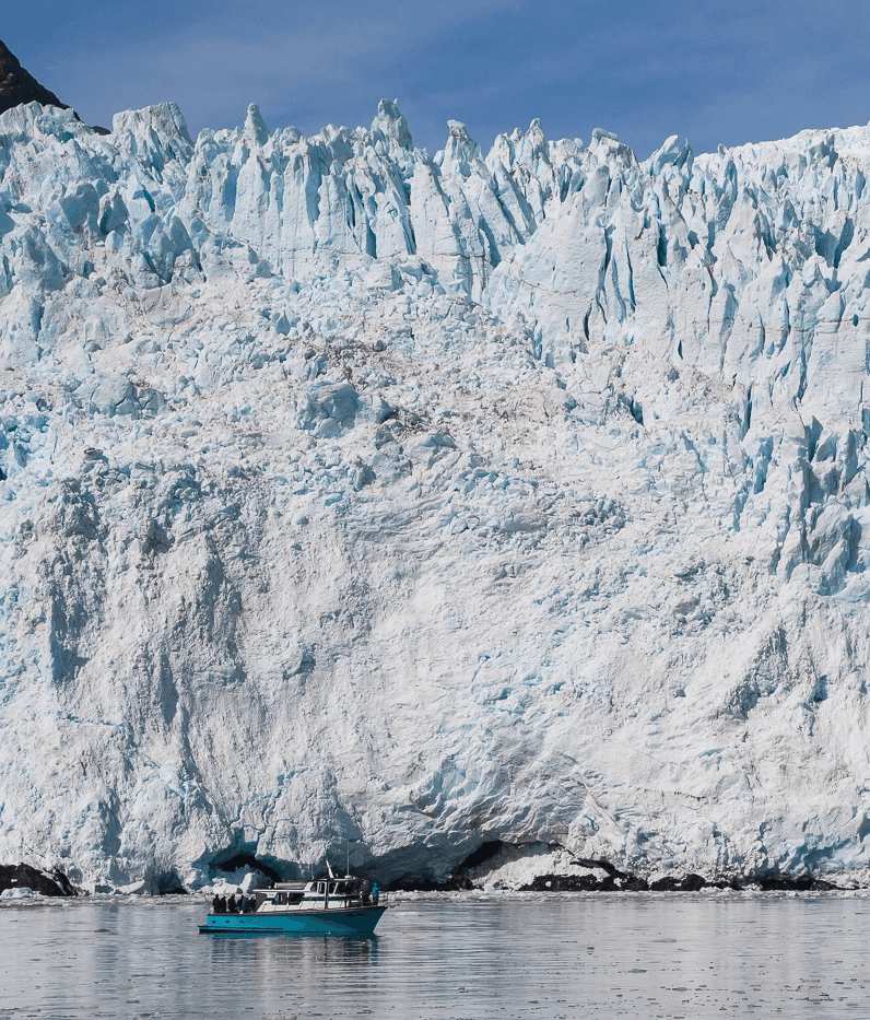 people in a large building with Tate Modern in the background
