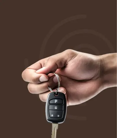 Person inserting coin into piggybank