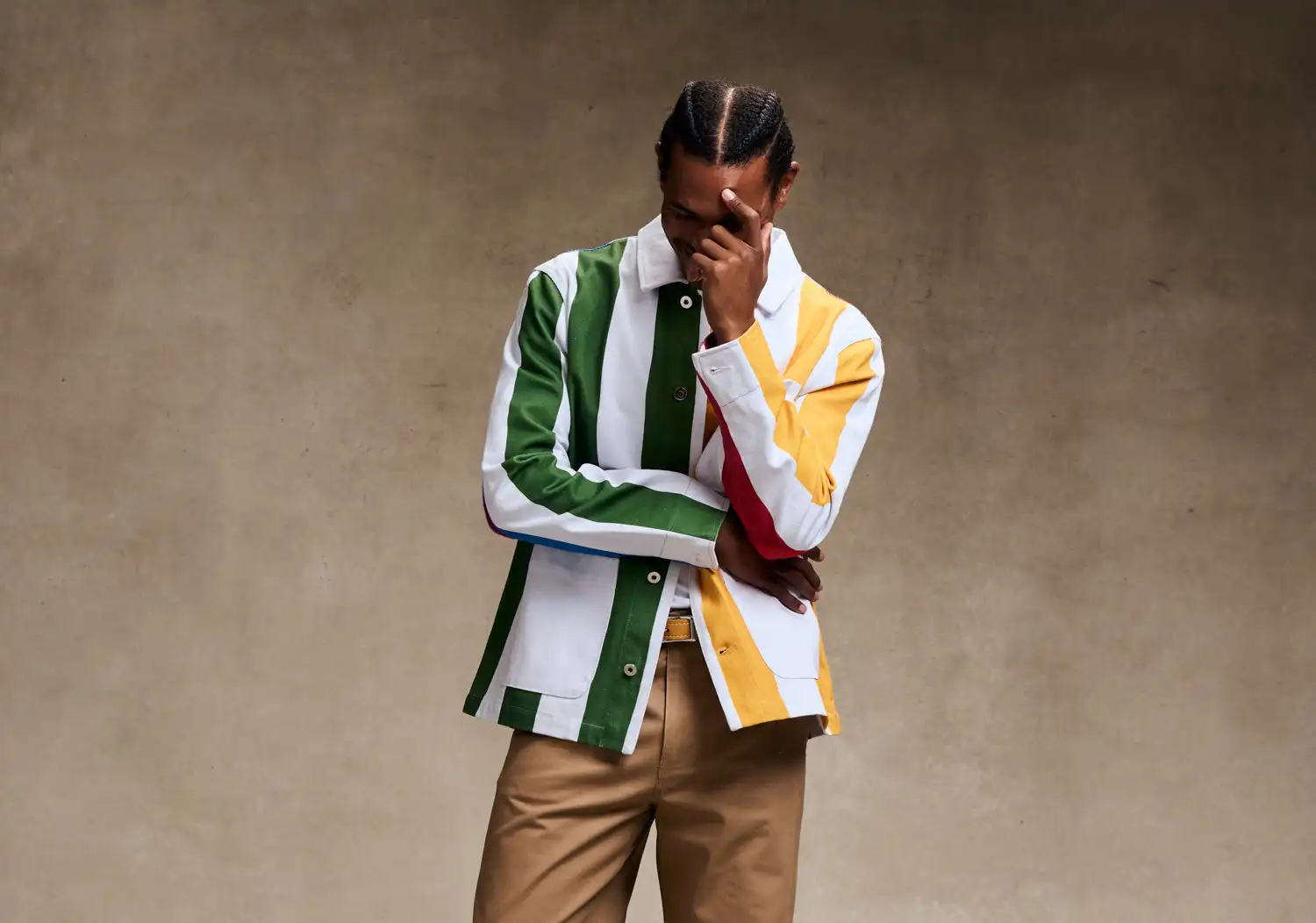 Minimalist lemon product photo with glass cup on pastel yellow background