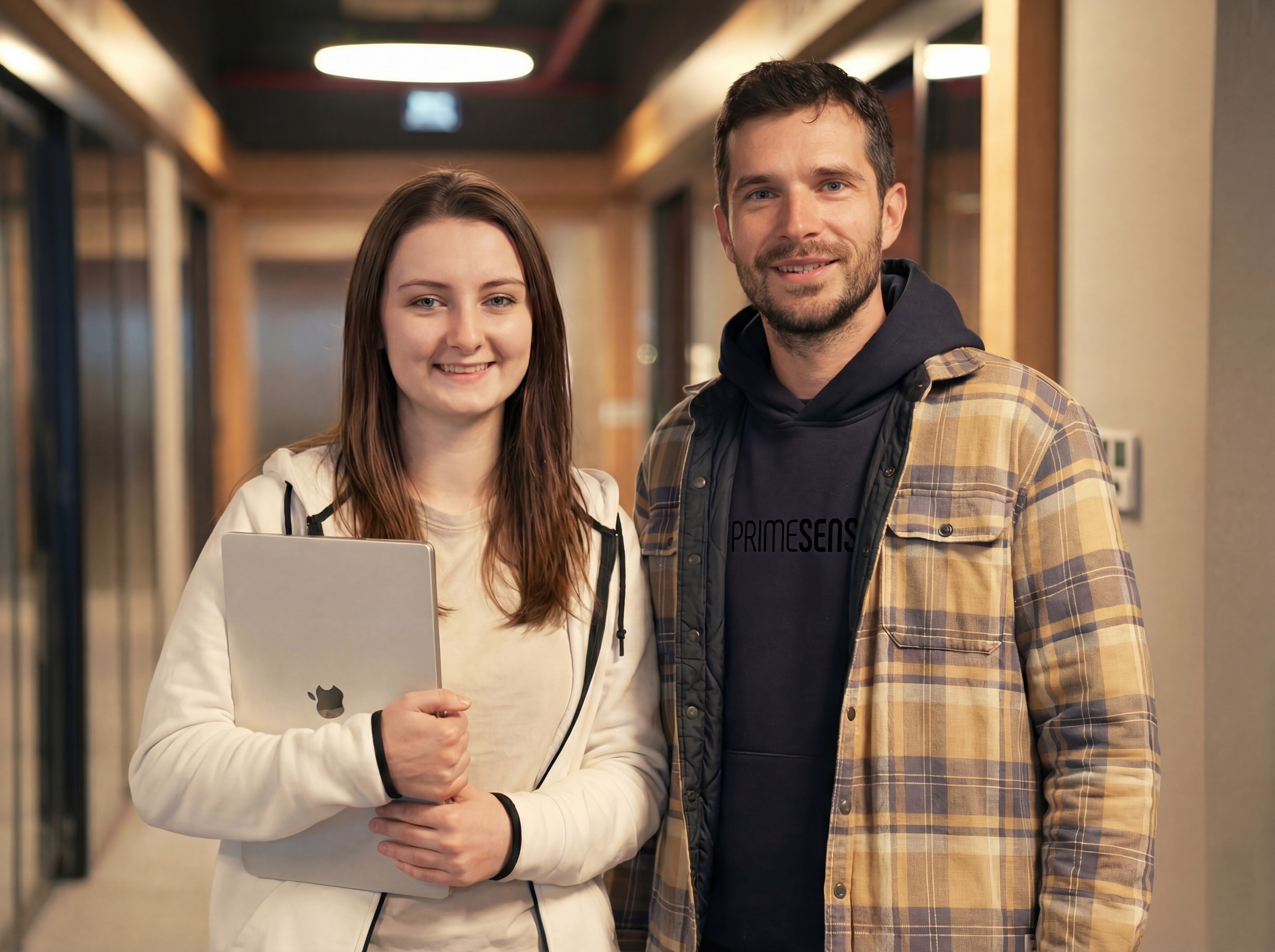 a couple of men standing next to each other