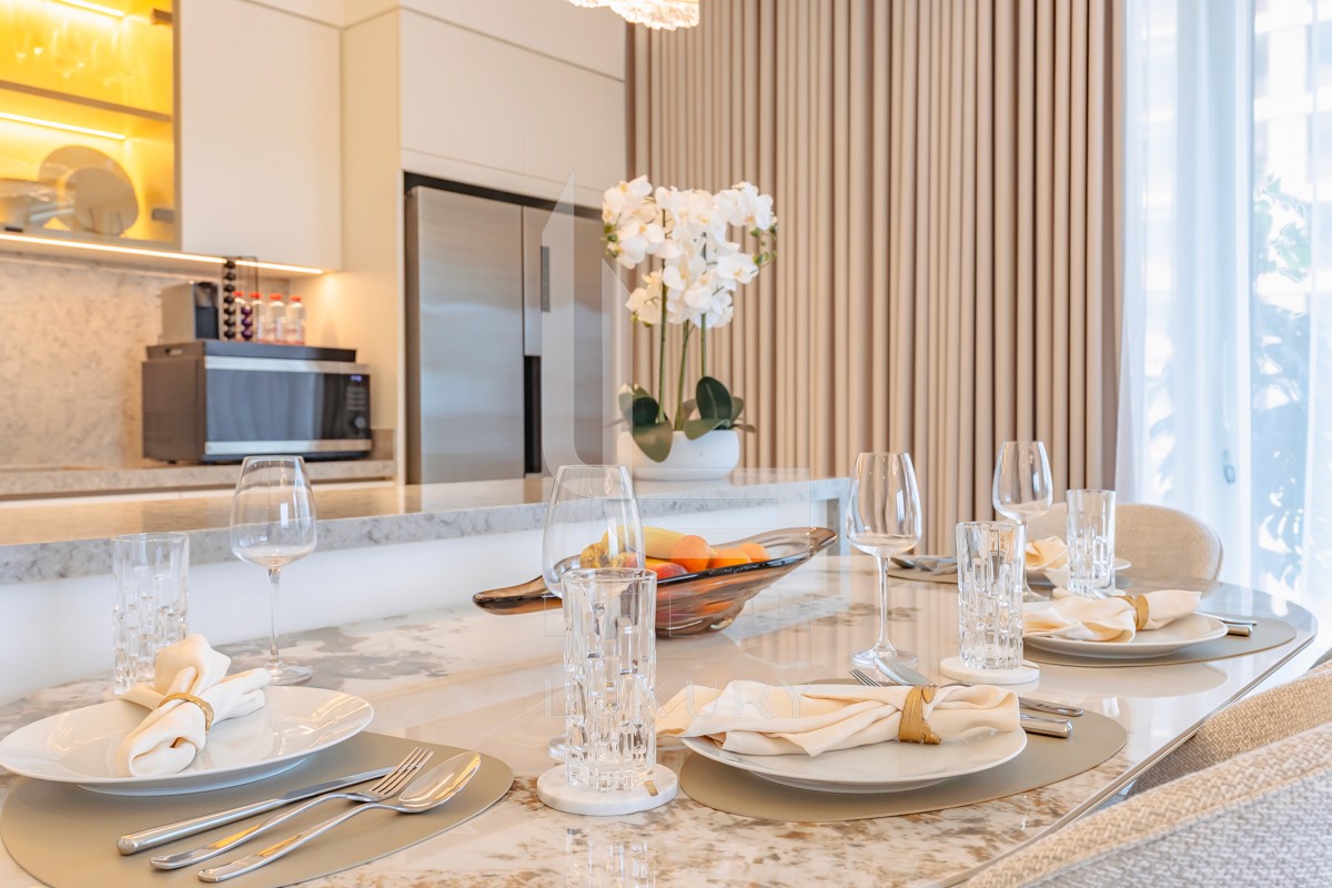 Enjoy meals together in the spacious dining area with seating for four, perfect for shared moments.