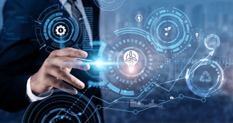 Aerial view of a winding road surrounded by dense green and yellow trees, showcasing nature’s vibrant colors.