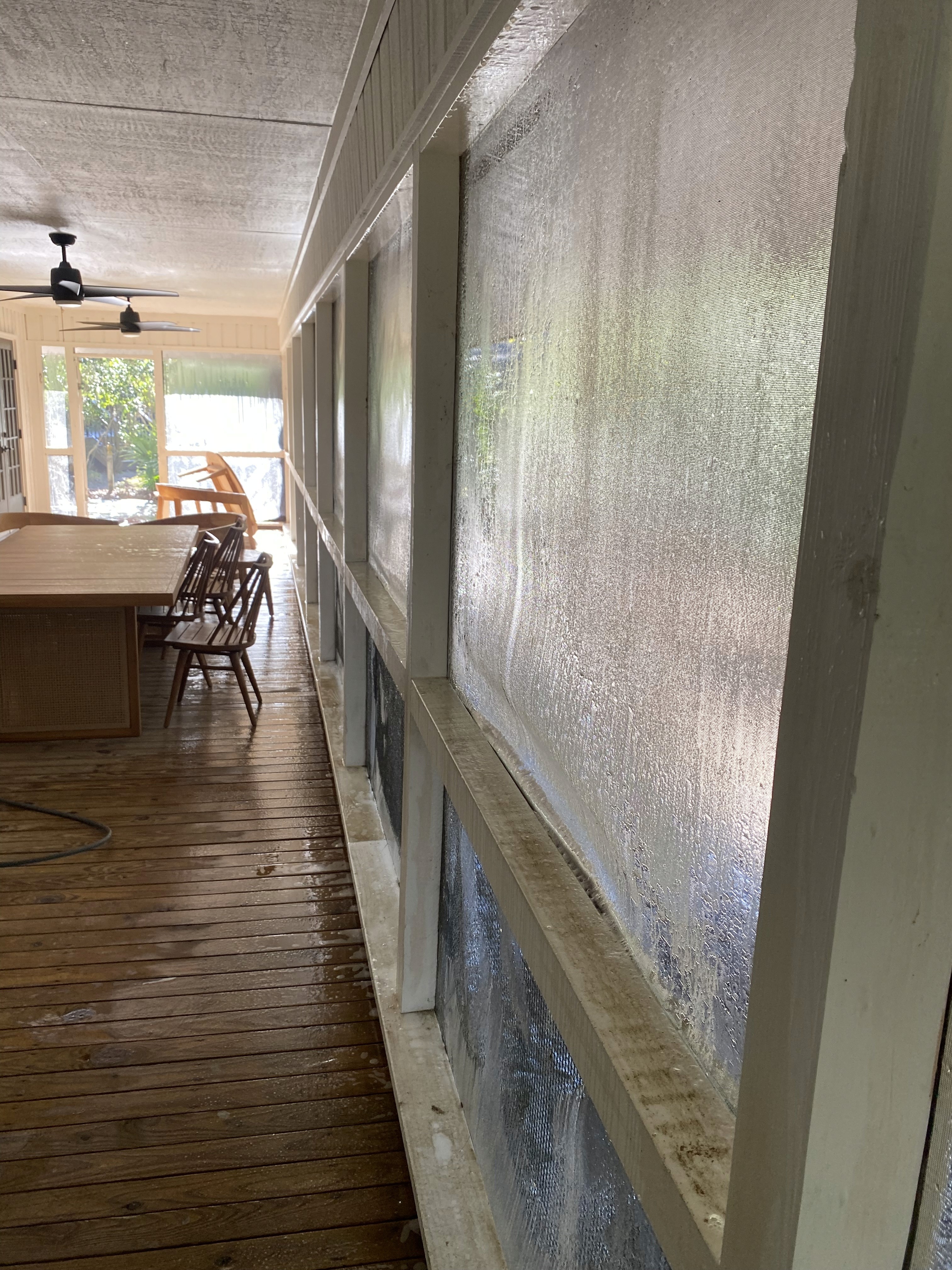 Close-up of dirty, streaked window showing need for professional cleaning.