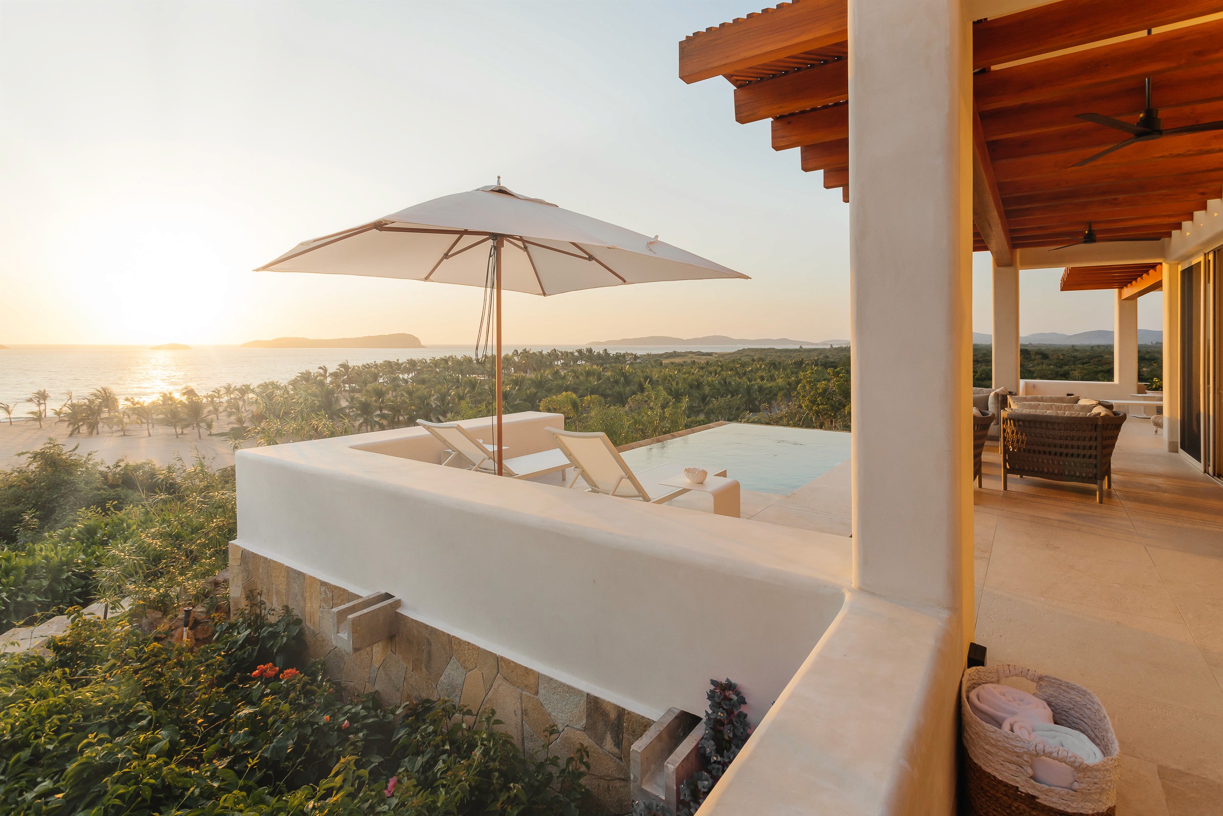 Sunset over the ocean from a private deck at Las Rosadas, Costalegre