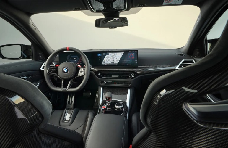 a close up of a steering wheel and dashboard of a car