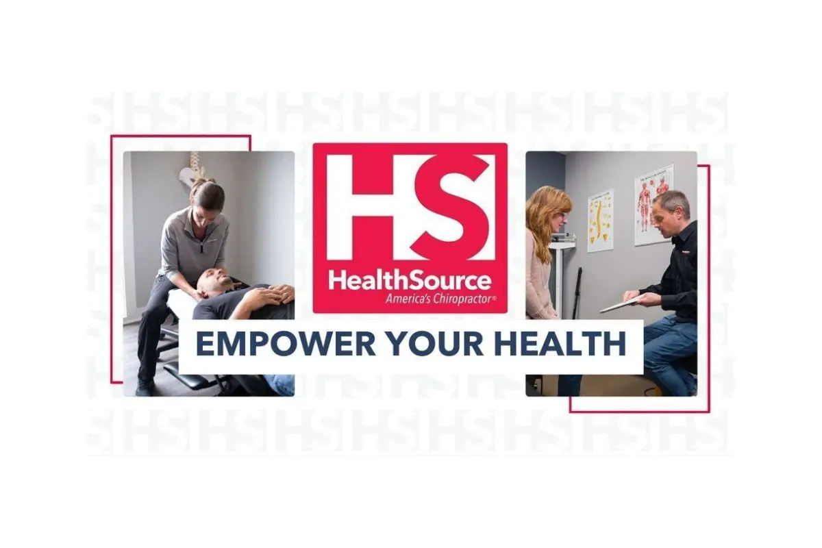 A healthcare professional is adjusting a patient's back on a chiropractic table, while another individual reviews information with a seated person, illustrating the comprehensive services at HealthSource, emphasizing the slogan "Empower Your Health."