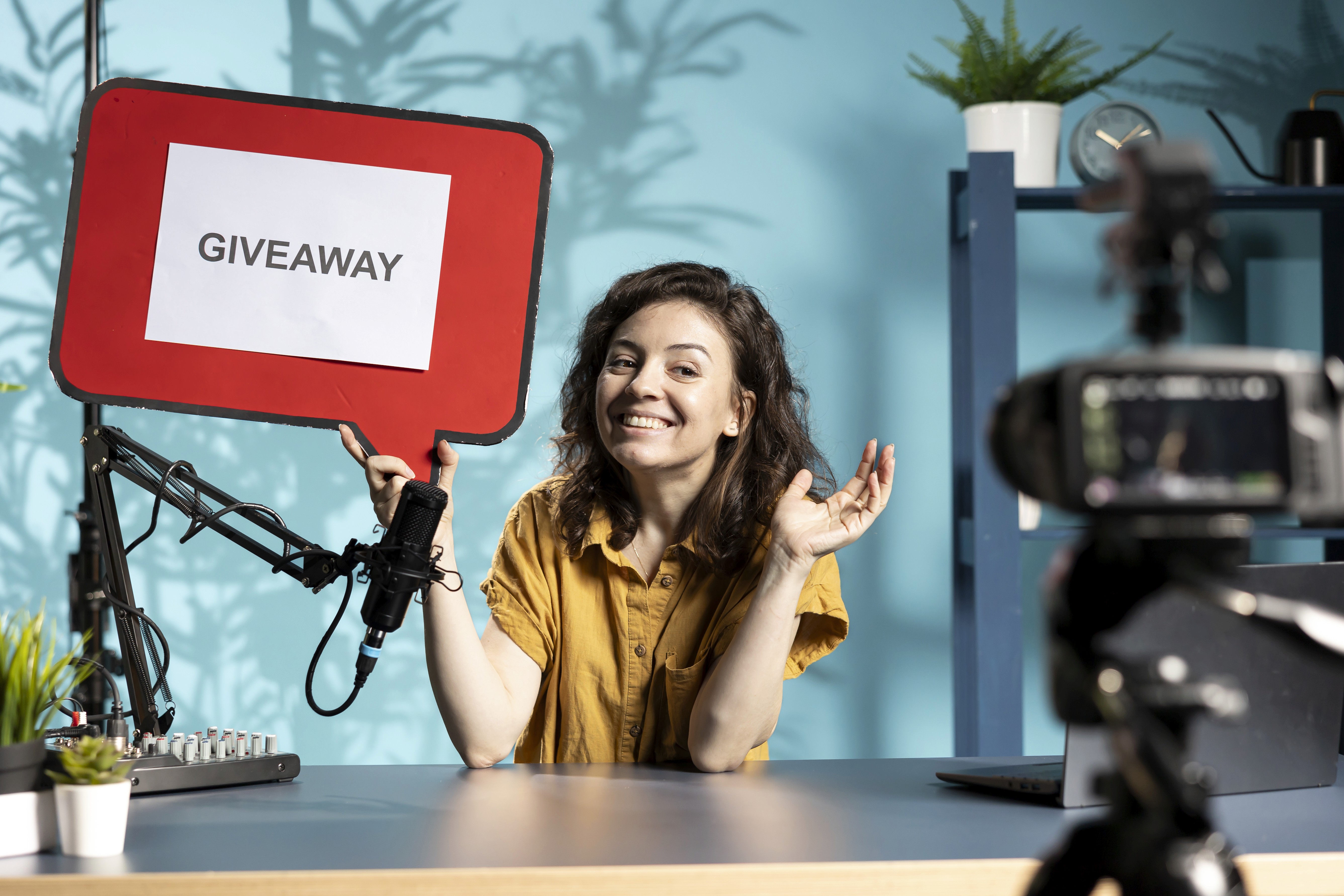 Creator hosting livestream giveaway while promoting TikTok Shop products and engaging audience with exclusive LIVE coupon offers.