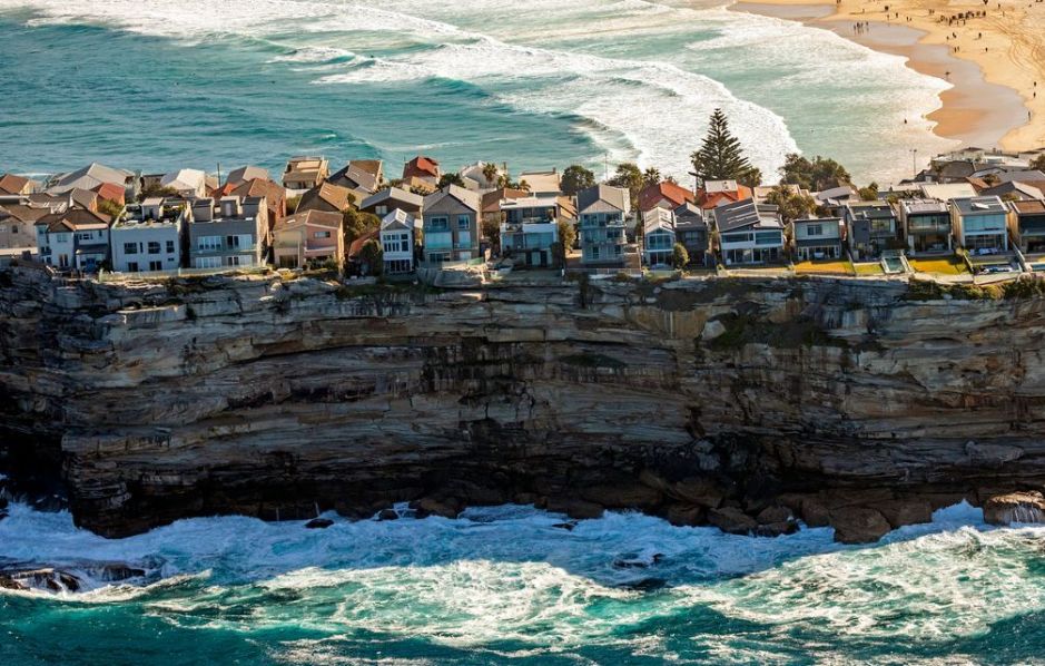 Cliffside homes overlooking the ocean and beach
