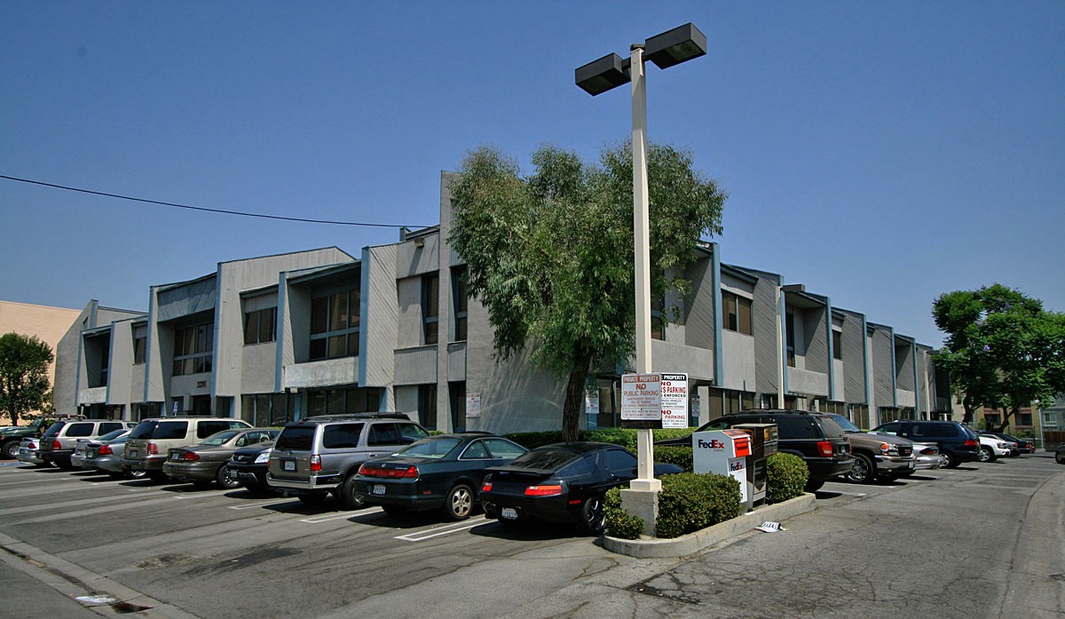 Old exterior view with cold colors, showcasing the outdated and less inviting design.