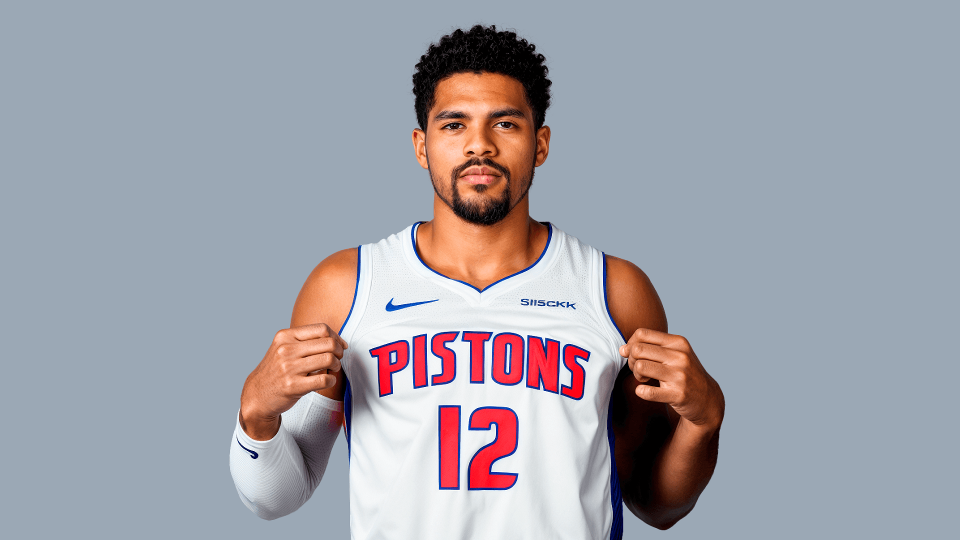 Fashion photoshoot with a woman posing in a dress