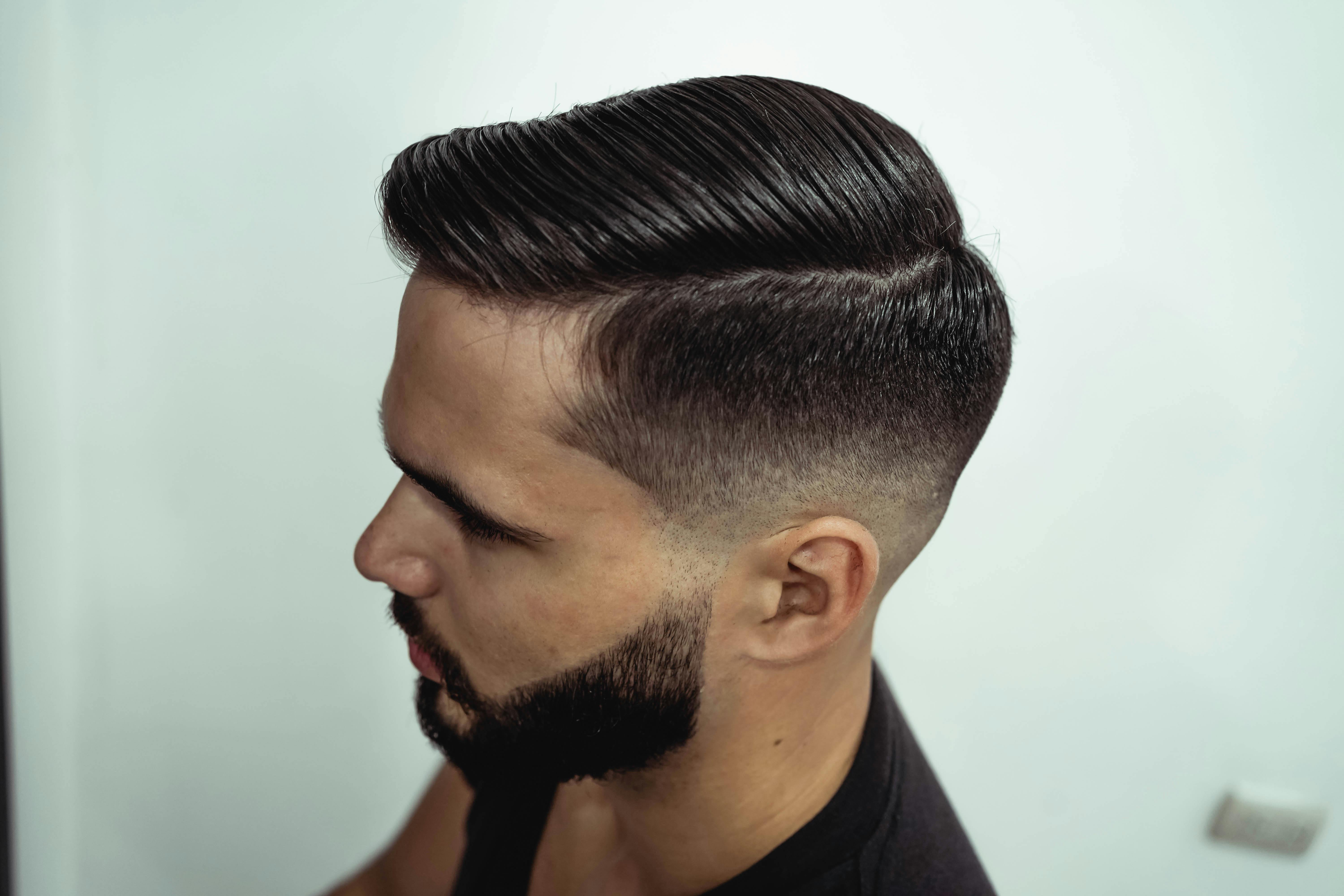 close-up-shot-of-a-man's-stylish-haircut-and-beard,-showcasing-grooming-precisio - iam-luisao (pexels)