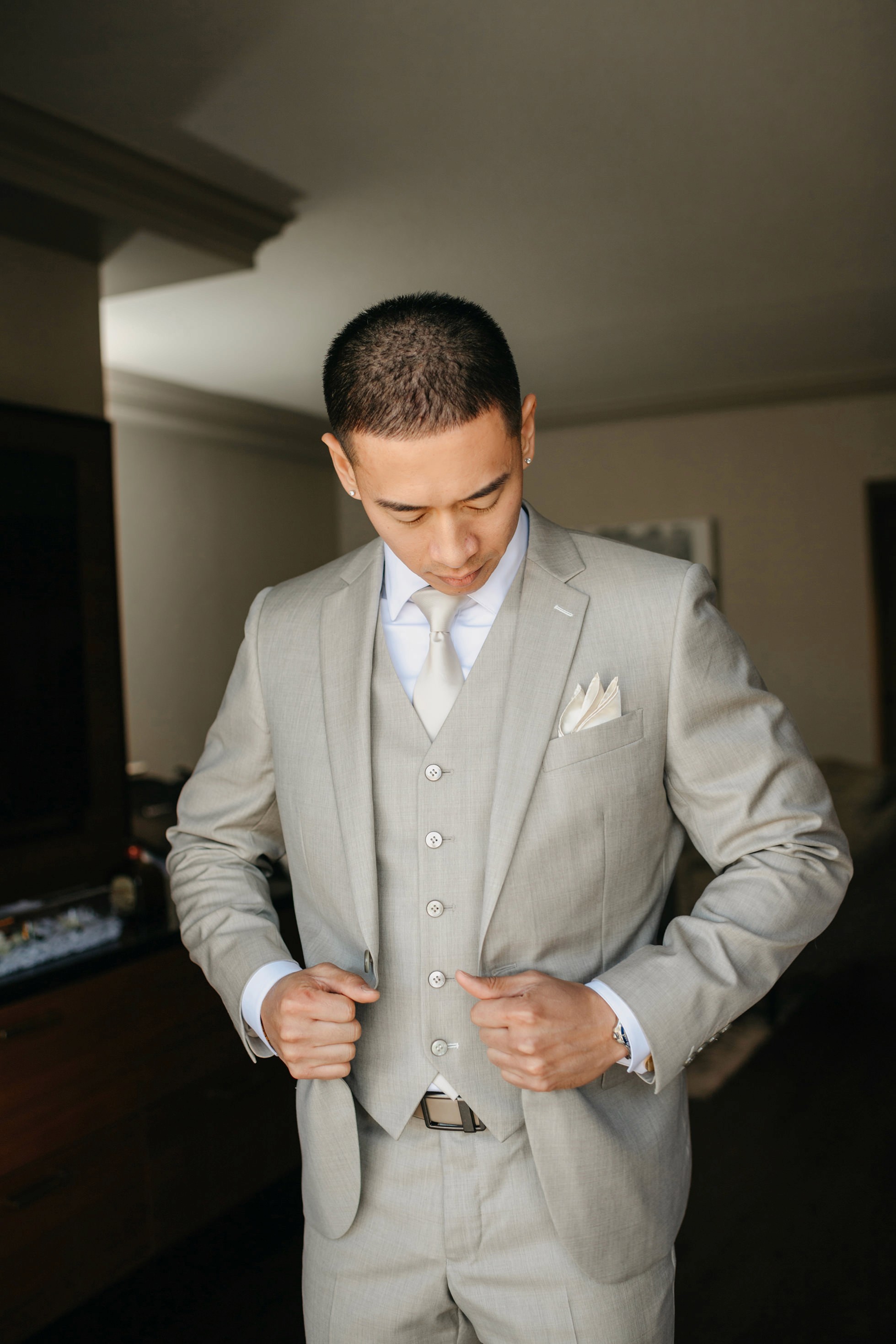 Flat lay wedding details with bouquet, rings, and sparkling bridal heels