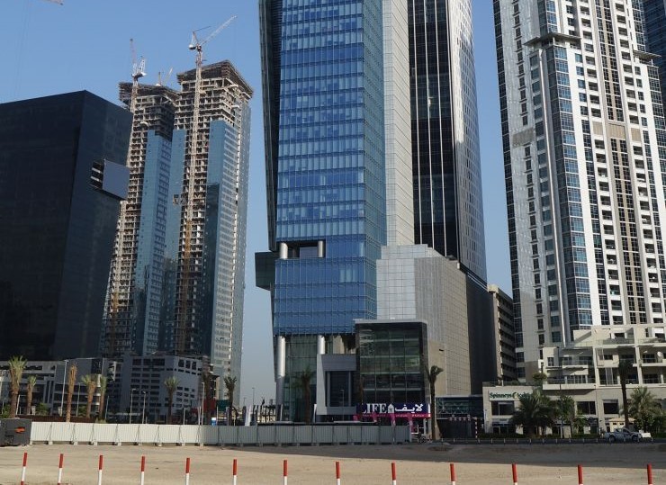 Vision Tower standing tall among Business Bay skyscrapers, showcasing luxury commercial property options.