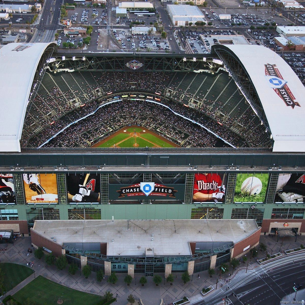 a black and white living room with a large tv