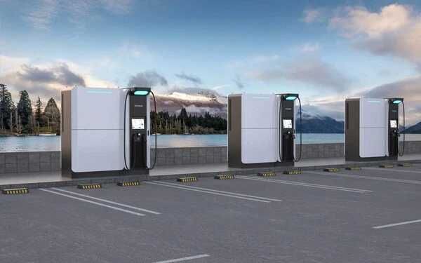 Three NZS chargers in a parking lot