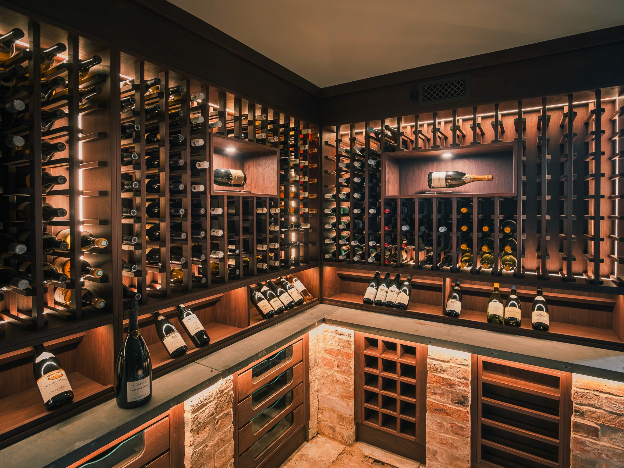 Bespoke residential wine cellar with illuminated timber racking