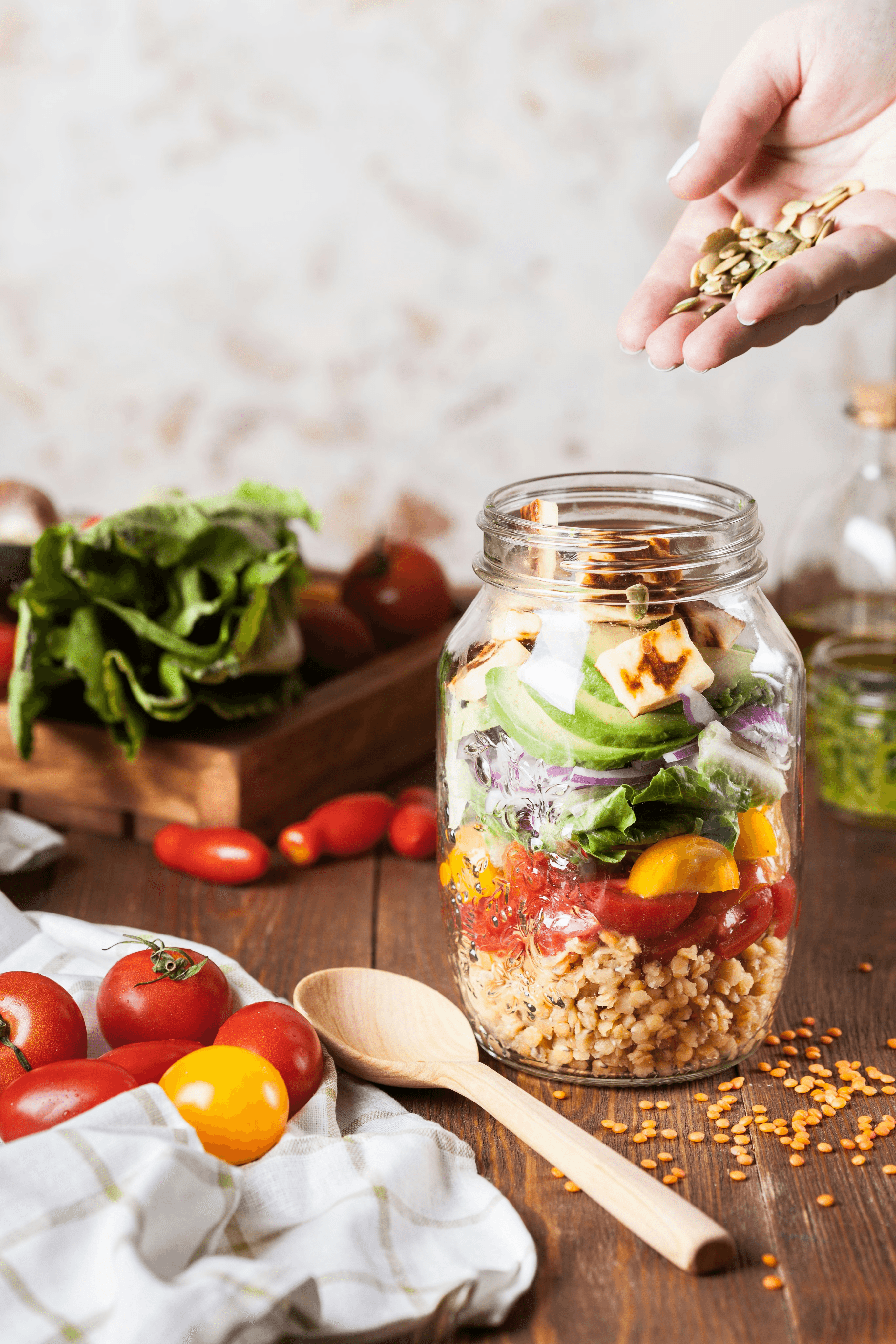 Vegetables and a jar of salad