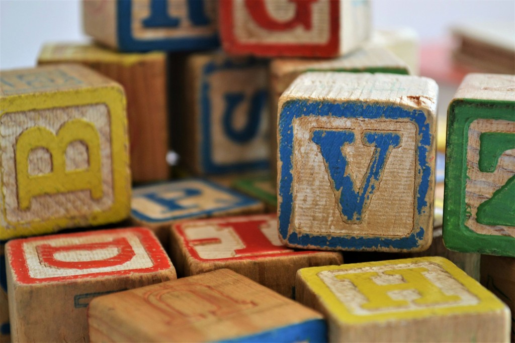 Colorful educational alphabet blocks representing toys and learning products category