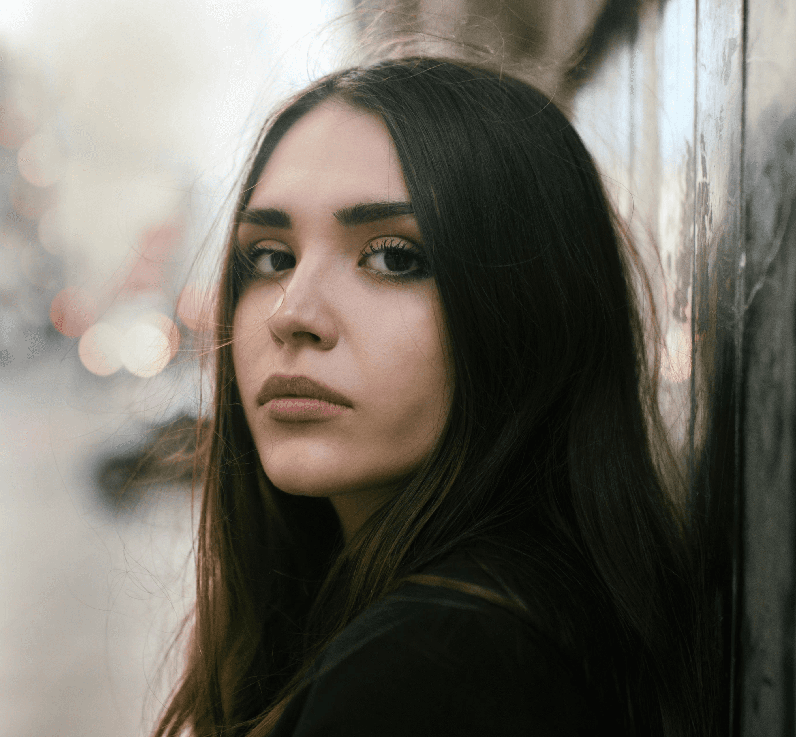 girl wearing black top selective focus photography