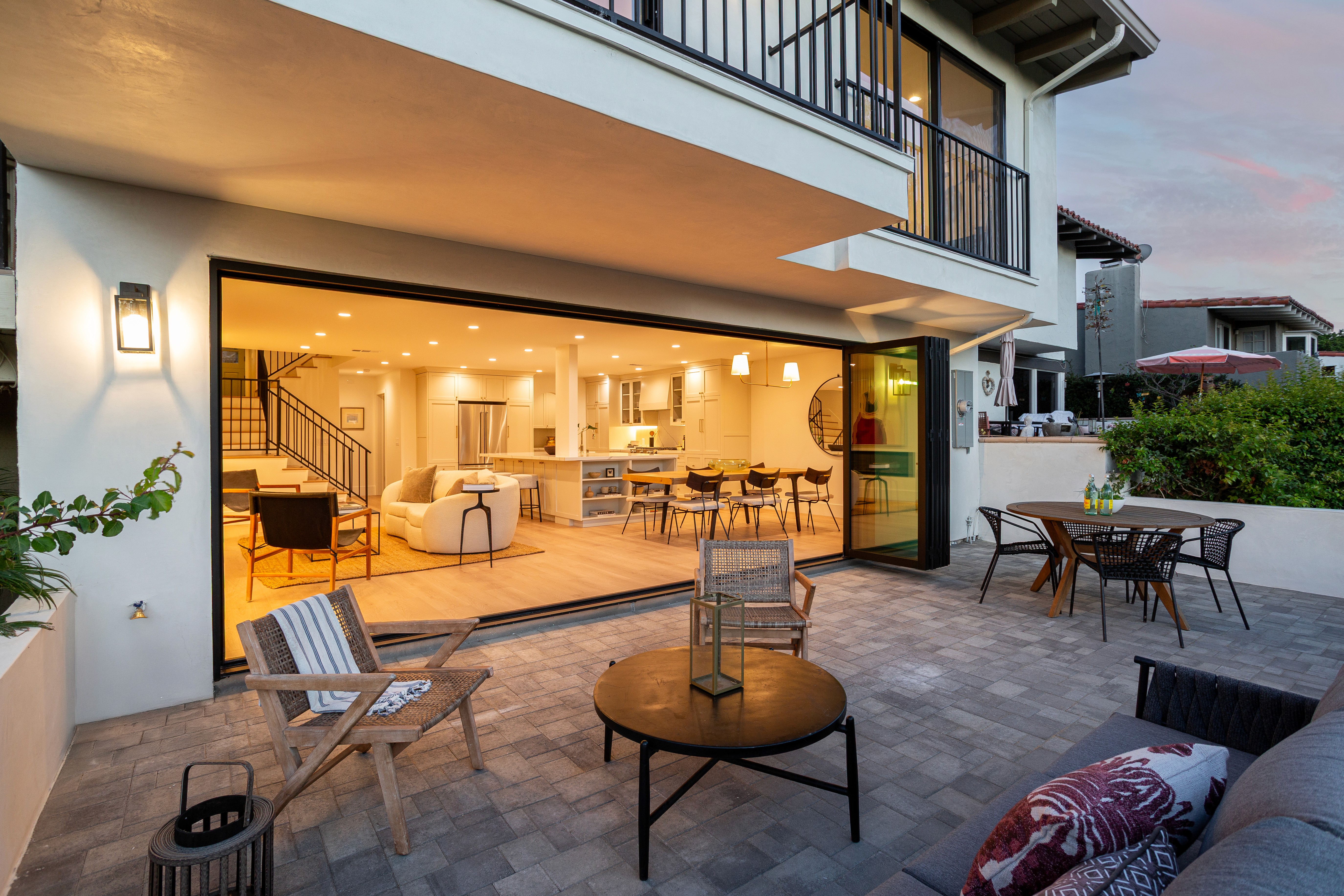Outdoor seating area with modern furniture and coastal accents