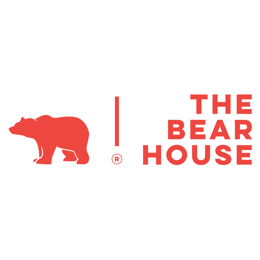 a black and white photo of a man in a coat