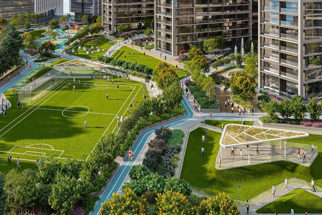 Aerial view of a city park near The Mirage at Sobha Central, showcasing green spaces and pathways.