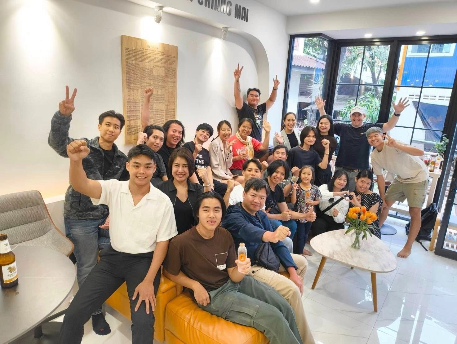 Group photo of attendees celebrating after a Bitcoin meetup at the Bitcoin Learning Center in Chiang Mai, Thailand