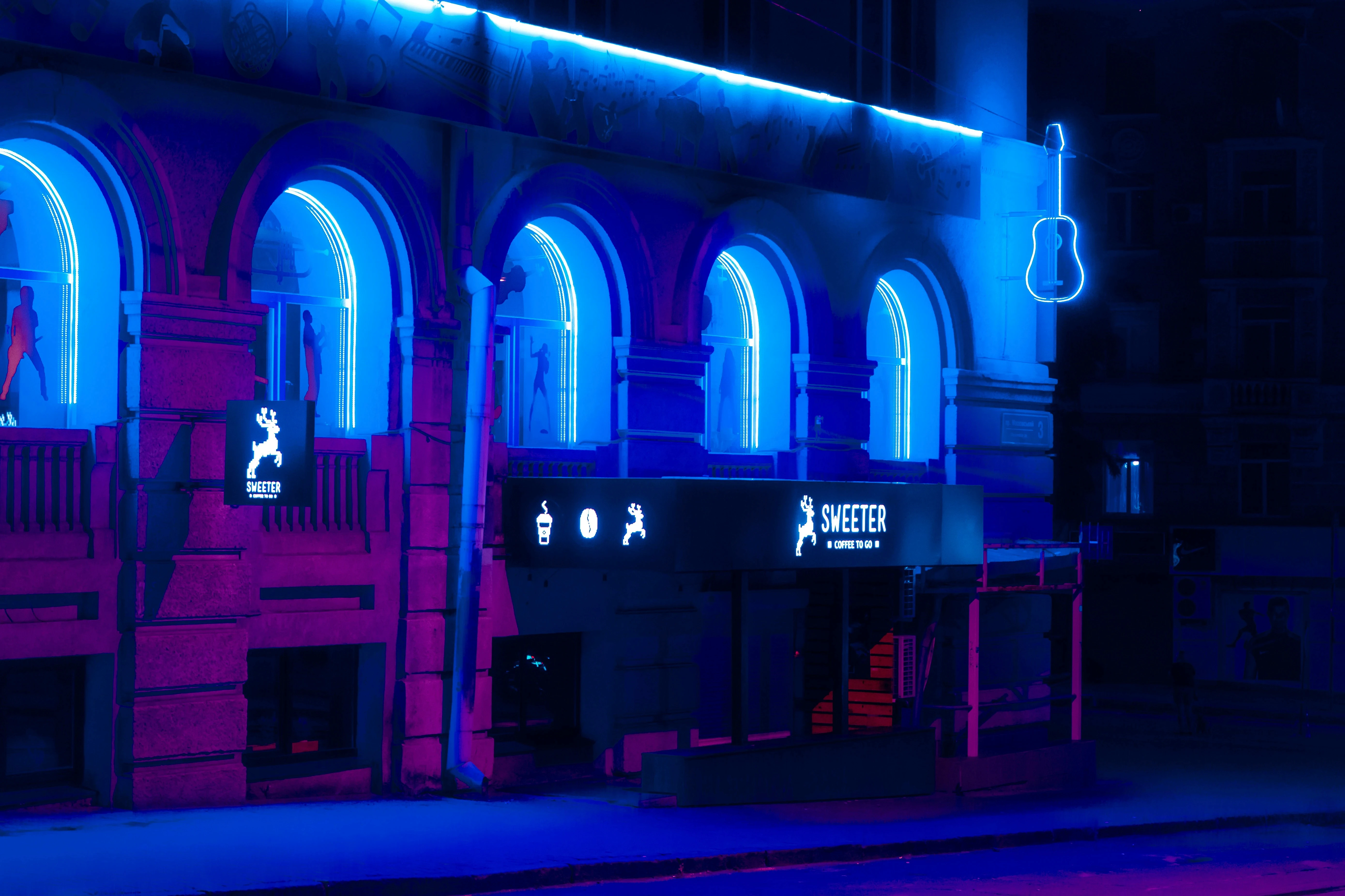 Abstract blue and purple light streaks forming a head shape