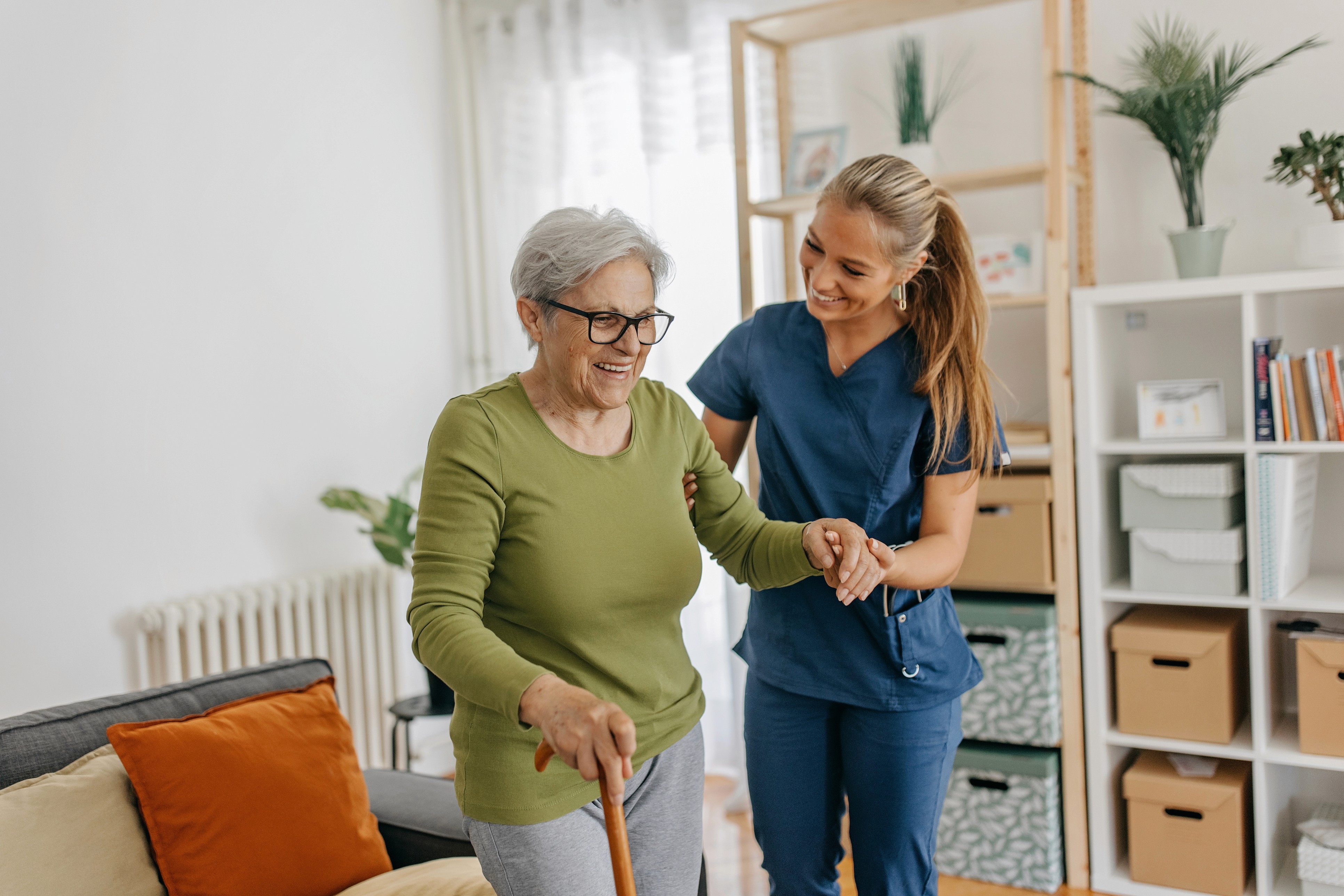 Picture of caregiver offering care for elderly at home