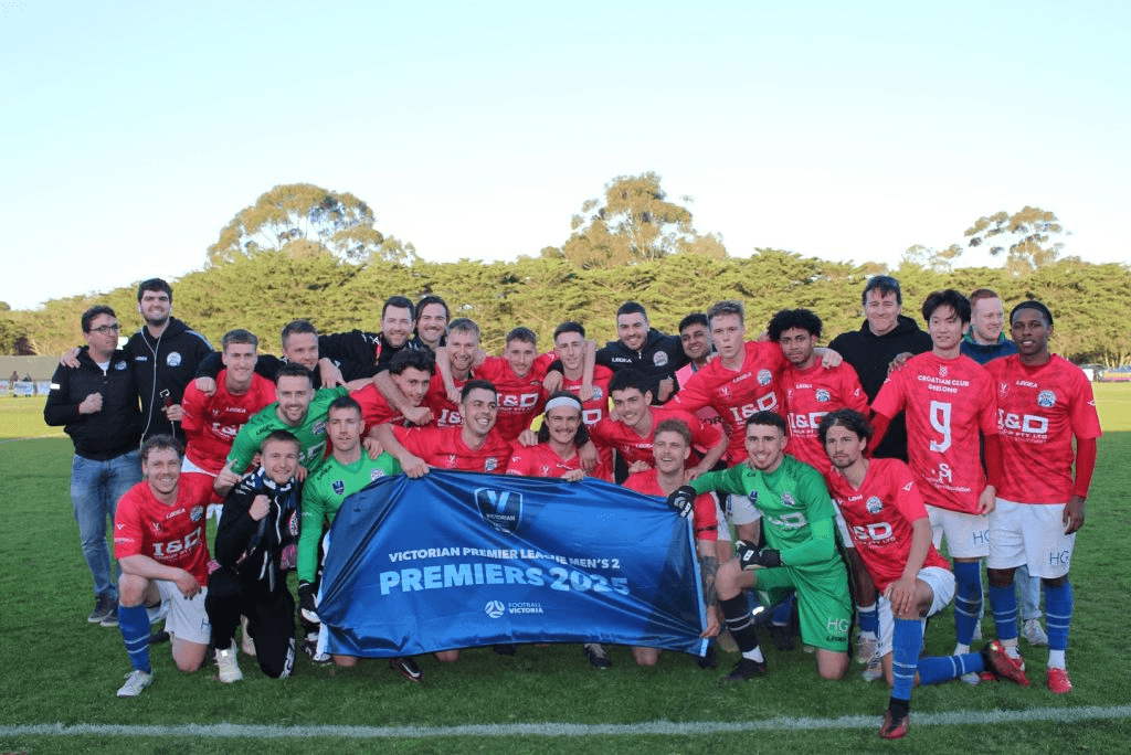North Geelong Warriors senior team celebrating promotion to VPL1