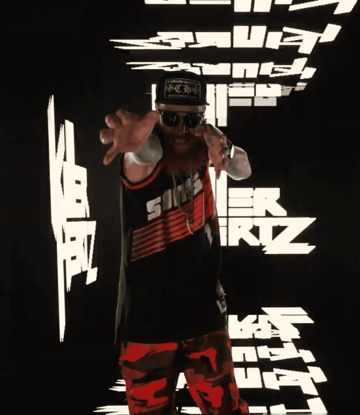 man in gray hoodie wearing black hat