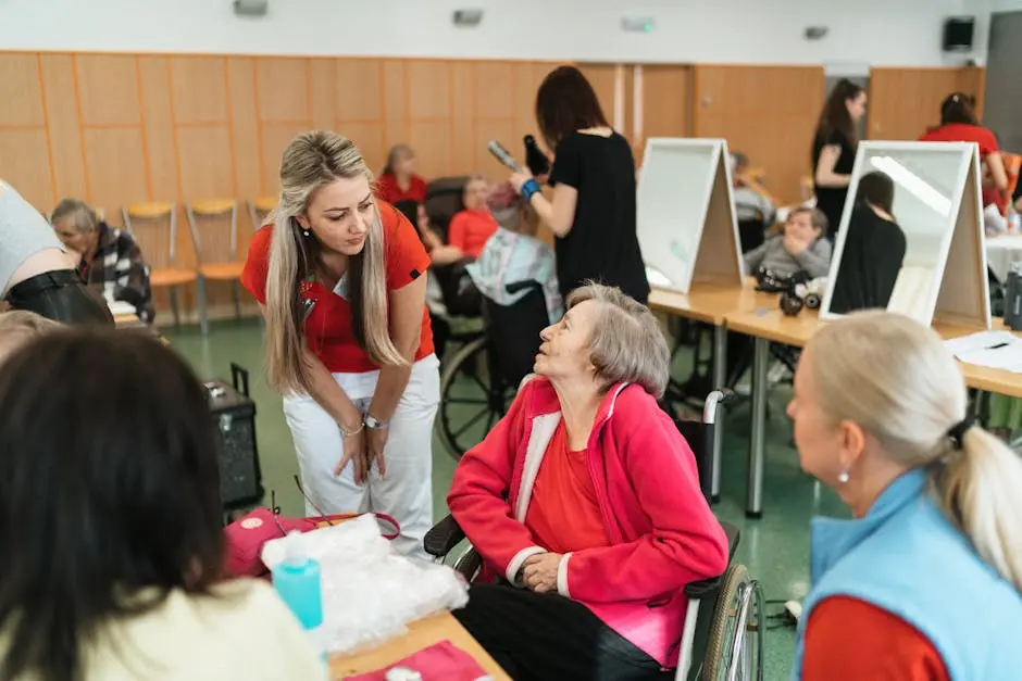 Caregiver Talking to an Elderly Woman on a Wheelchair