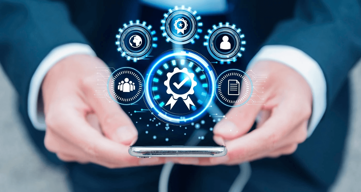  Hand holding smartphone with digital icons - Technical Screening Tools