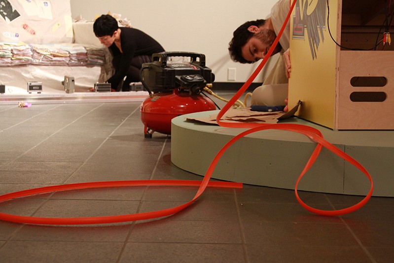 students setting up an exhibition
