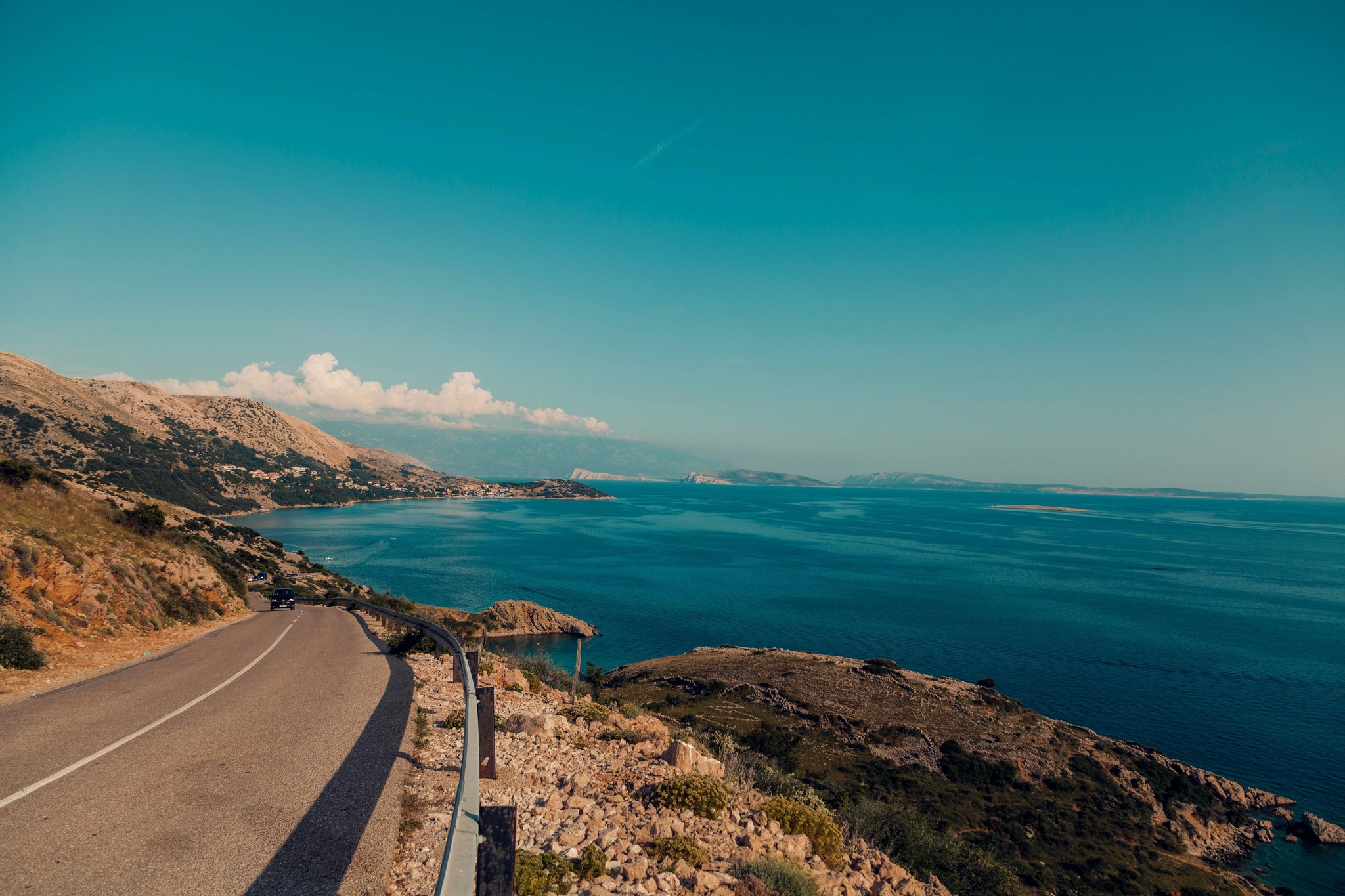 cliffside road with a ocean view