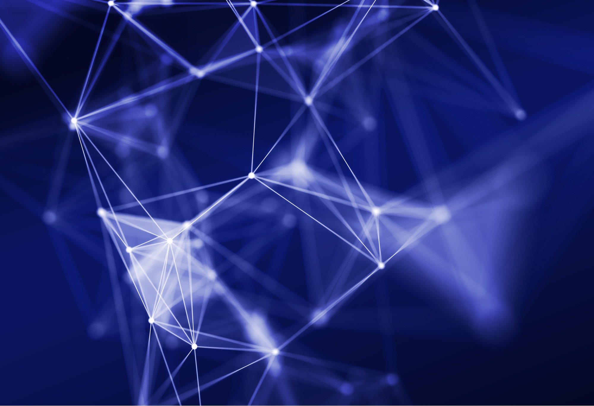 Abstraktes Netzwerk aus verbundenen Linien und Knoten auf blauem Hintergrund als Visualisierung von KI, Datenstrukturen und digitaler Vernetzung
