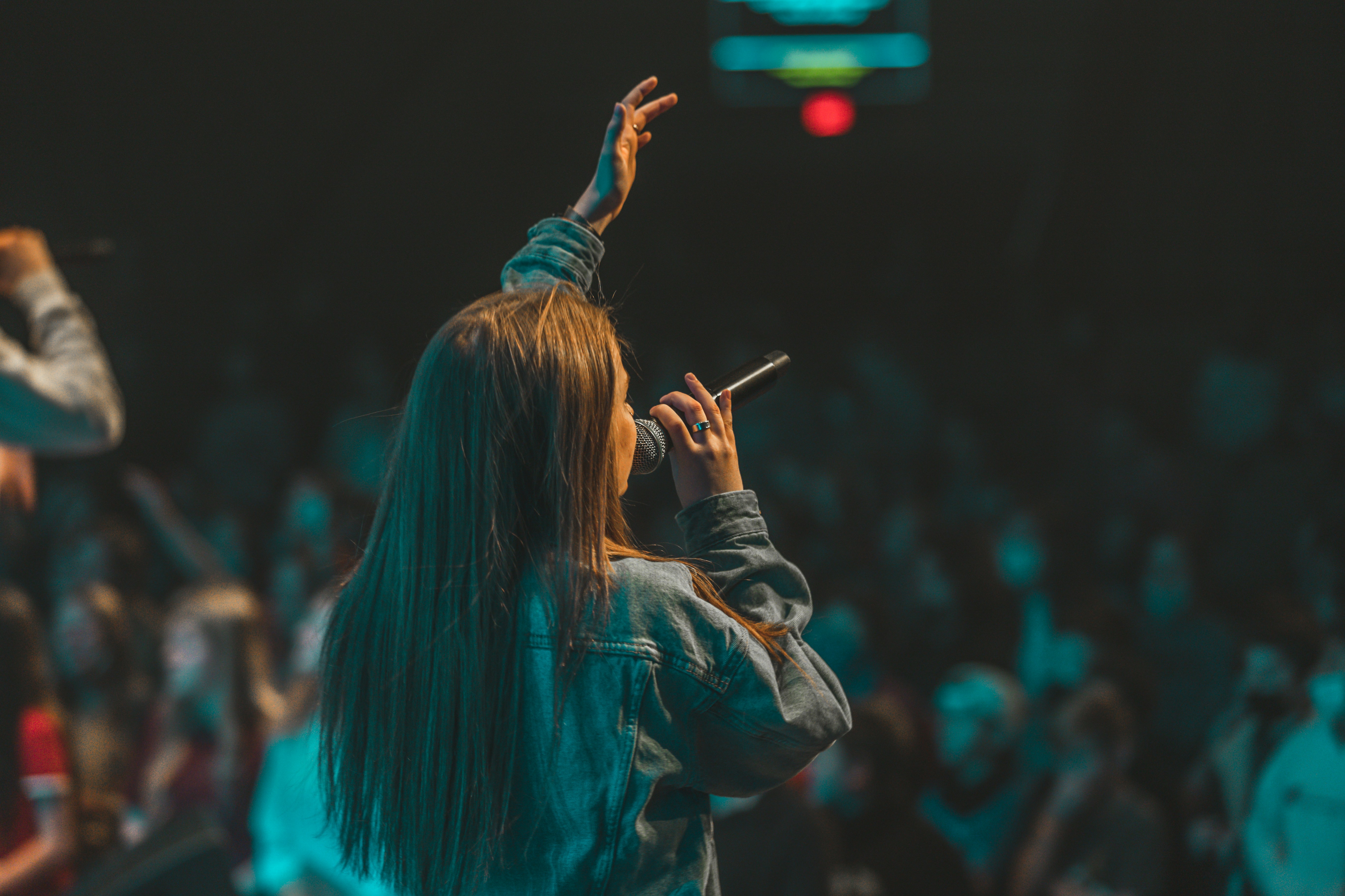 Female singer on stage - vocalist vs singer