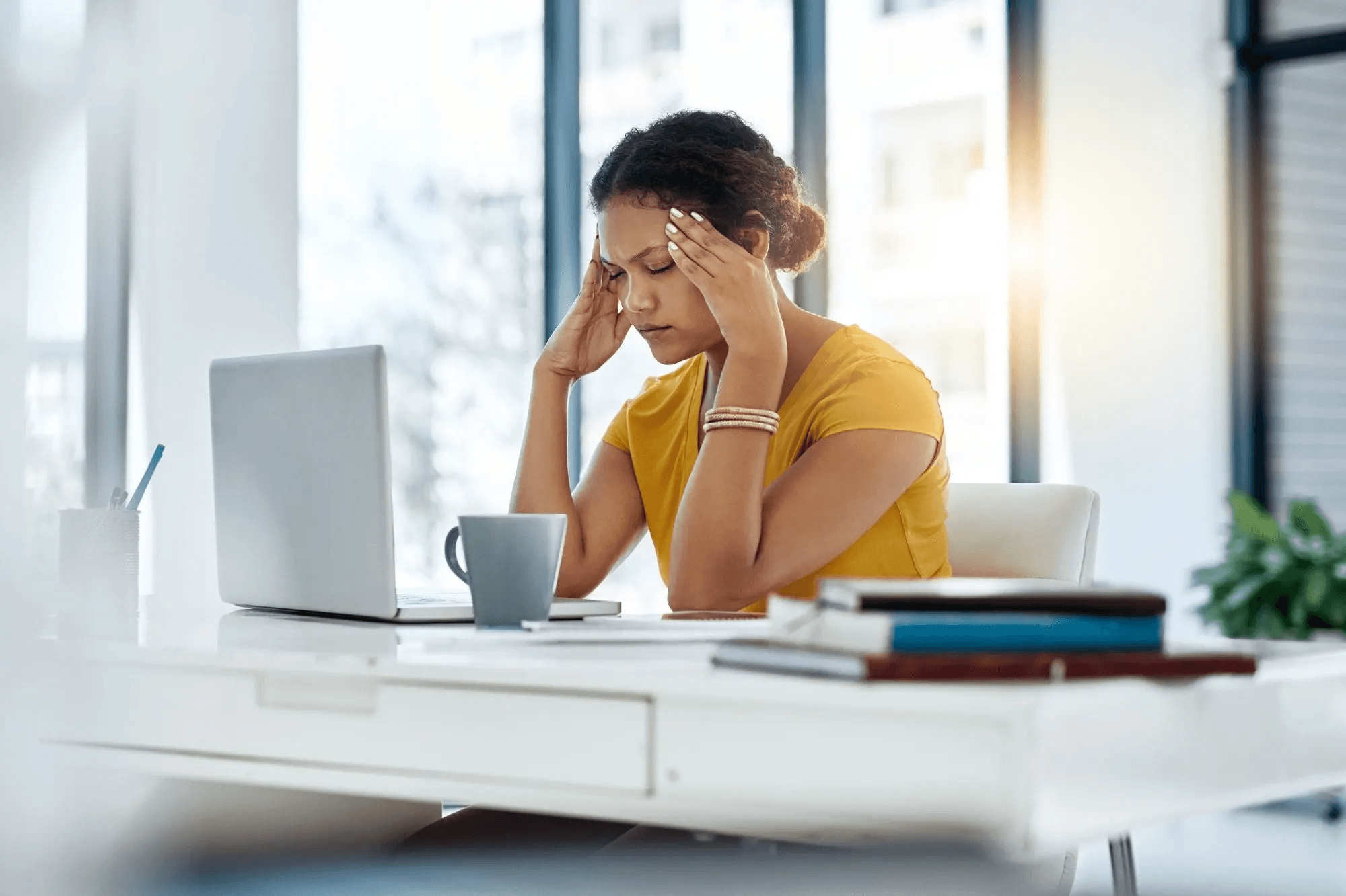 woman looking stressed - Effective Methods for Categorizing Spend Data