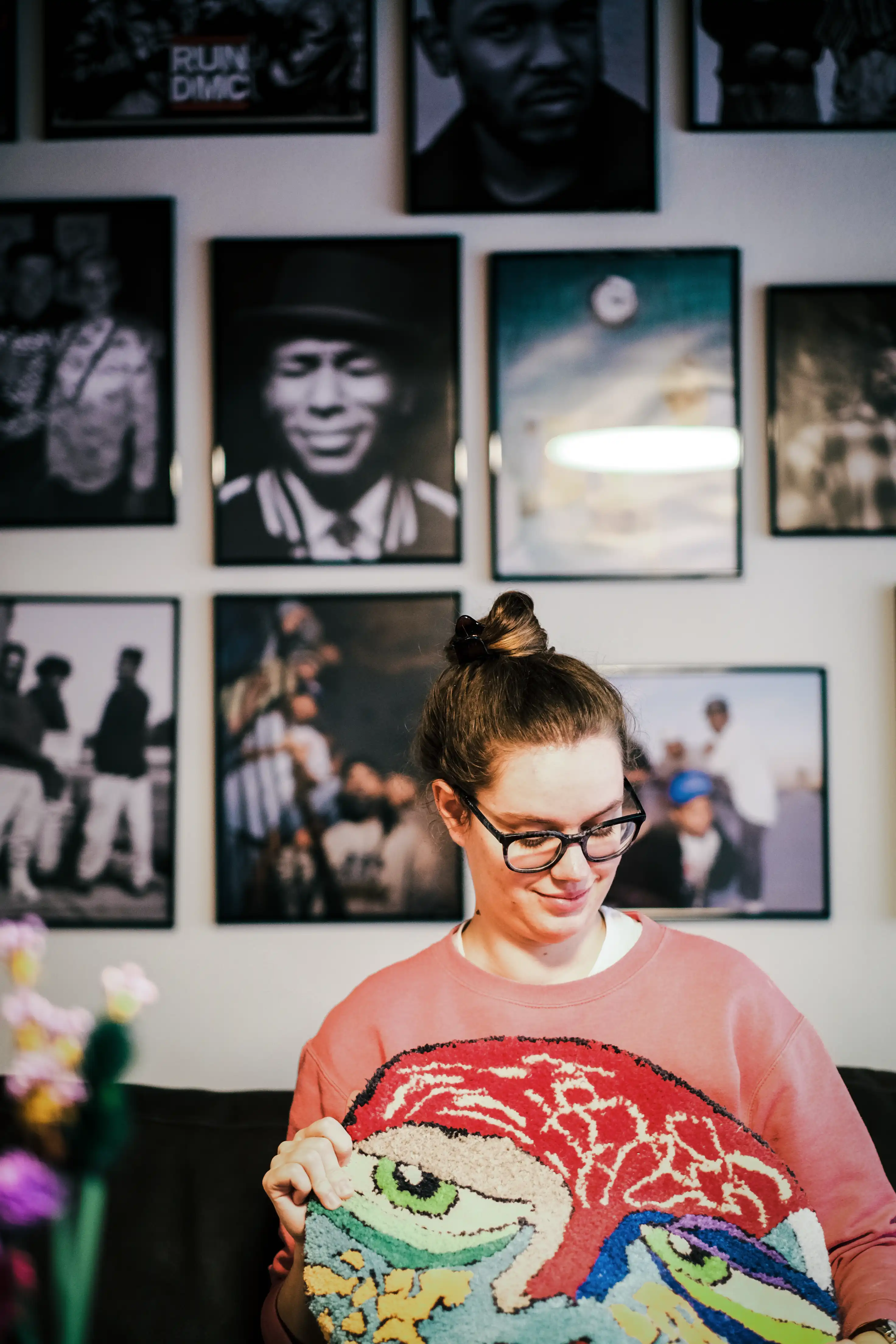 Women holding a selfmade tuffed carpet