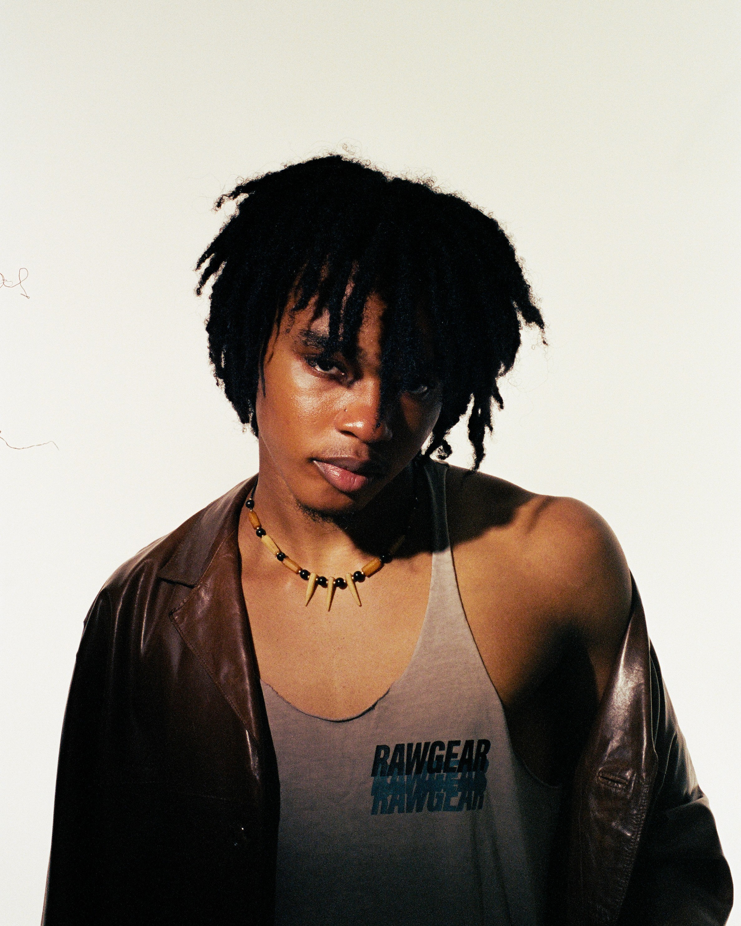 Black man, High contrast image of a fashion model on a white background