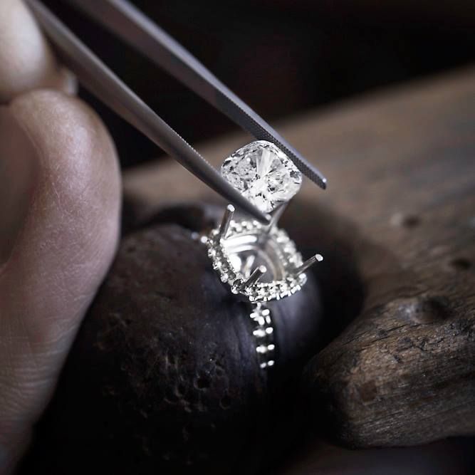 silver ring on persons finger