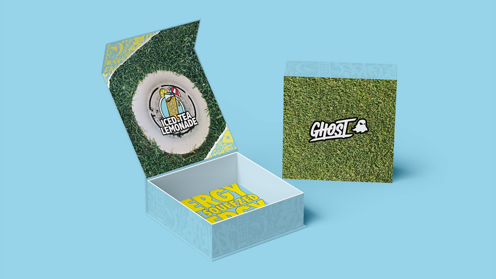Packaging mockup for a Ghost Energy Iced Tea Lemonade campaign featuring a golf-inspired seed kit with turf textures, branded graphics, and custom promotional packaging.